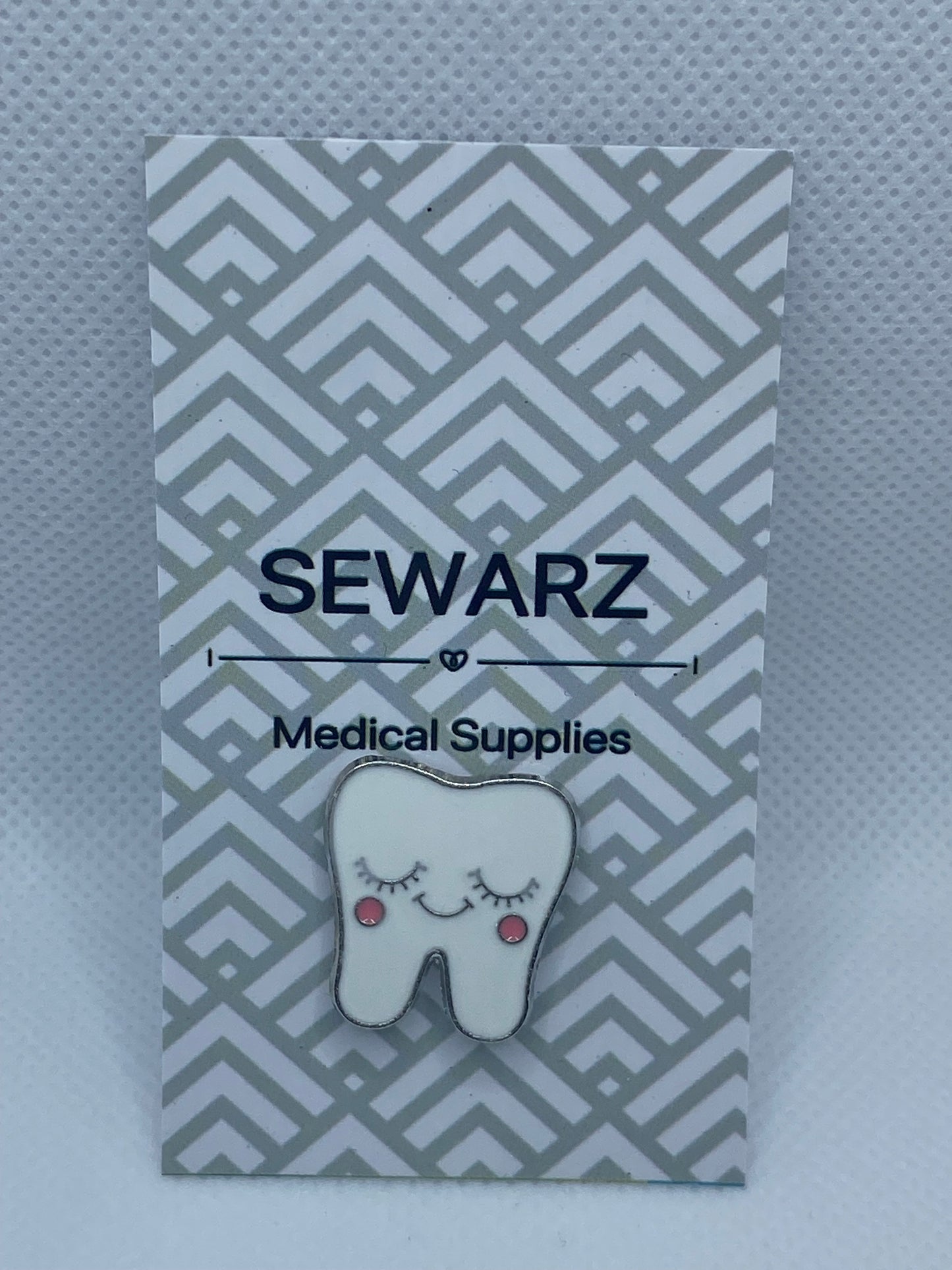 Tooth Brooch